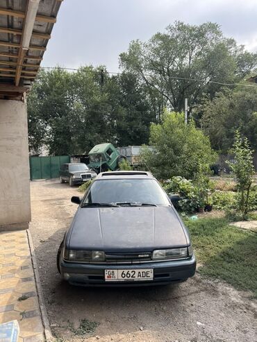 дом меняю: Mazda 626: 1989 г., 2 л, Механика, Бензин, Хэтчбэк