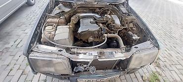 mercedes 4 goz dizel: Mercedes-Benz W124 sedan, qara rəng. Klassik 4 qapılı kuzov, polad — 4