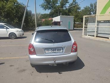 e53 amg: Mazda 323: 2003 г., 1.5 л, Механика, Универсал — 2
