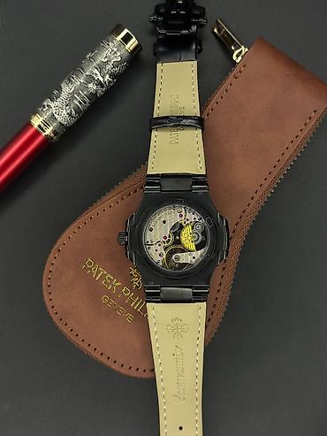 Aksesuarlar: * Brend: Patek Philippe * Model: Nautilus * Növ: Kişi qol saatı * — 3
