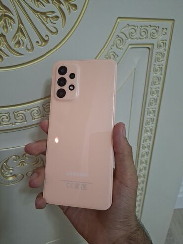 Toyota: Samsung Galaxy A23 5G, 128 ГБ, цвет - Оранжевый, Отпечаток пальца