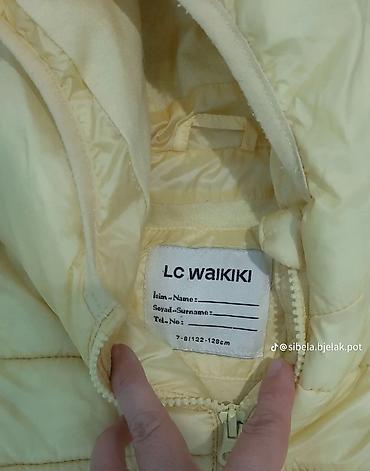 invento cizme: Dečija jakna LC Waikiki, sa kapuljačom - Model: lagana, prošivena — 2