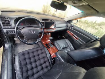 скутер 150 кубов по документам 50 купить: Черный седан Toyota Camry с тонированными стеклами, оснащенный литыми