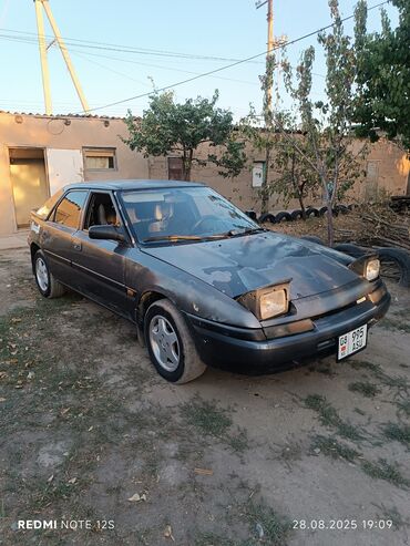 Mazda: Mazda 323: 1991 г., 1.6 л, Механика, Бензин, Хэтчбэк — 4