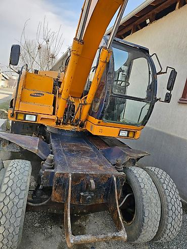 Экскаваторы: Экскаватор, Samsung, 1998 г., Колесный — 20