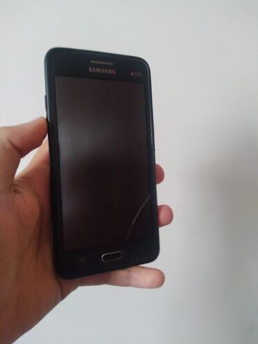 telefon gencede: Samsung Galaxy J2 Prime, 8 GB, rəng - Boz, Düyməli, Sensor