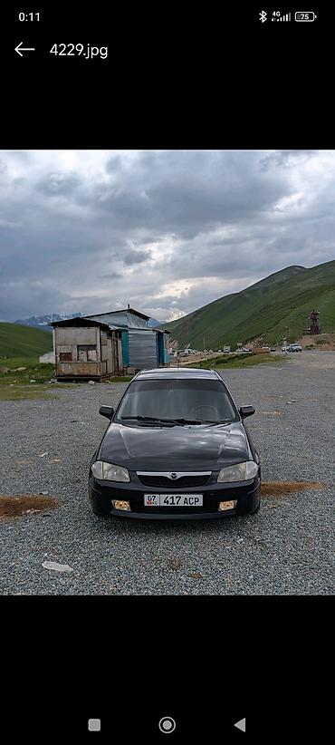 наклейки бмв: Mazda 323: 1999 г., 1.5 л, Механика, Бензин, Универсал — 1
