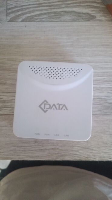 ip телефон: Оптический сетевой терминал DATA в компактном белом корпусе