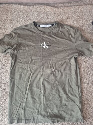 Рубашки: Мужская футболка, Calvin Klein, S (EU 36), цвет - Зеленый