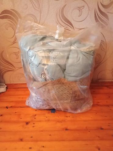 Текстиль: Vakuum paketdə tekstil dəsti - Şəffaf iri ölçülü paketdə yığılmış ev — 1