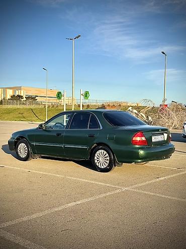 Hyundai: Hyundai Sonata: 2 l | 1997 il Sedan — 6
