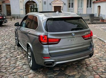 приборная панель бмв: Автомобиль BMW X5 серого цвета с люком на крыше. Этот кроссовер