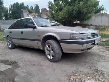 7 местная машина: Mazda 626: 1991 г., 2 л, Механика, Бензин, Универсал