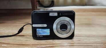 фотоаппарат с видеокамерой: Цифровой фотоаппарат Samsung S760 Для хранения данных используются