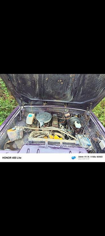 avtomobil ustu cadir: GAZ Volga sedan - Kuzov: bənövşəyi rəng, 4 qapı, klassik Volga — 2