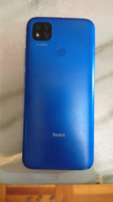 redmi a1plus: Xiaomi Redmi smartfon - Model: Redmi (mavi rəng, arxa hissədə “Redmi” — 2