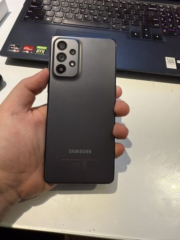 Samsung Galaxy A73 5G, 128 ГБ, цвет - Черный, Отпечаток пальца