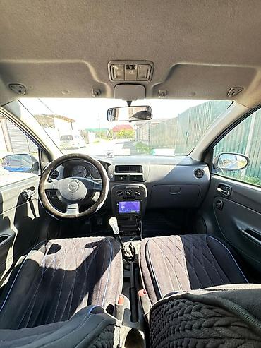 дейхатсу куоре: Daihatsu Cuore: 2003 г., 1 л, Механика, Бензин, Хэтчбэк — 5