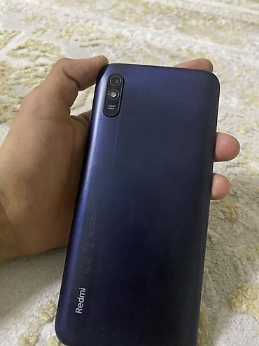 комп цена: Смартфон Redmi (серия A) в темно‑синем цвете с фиолетовым бампером — 2