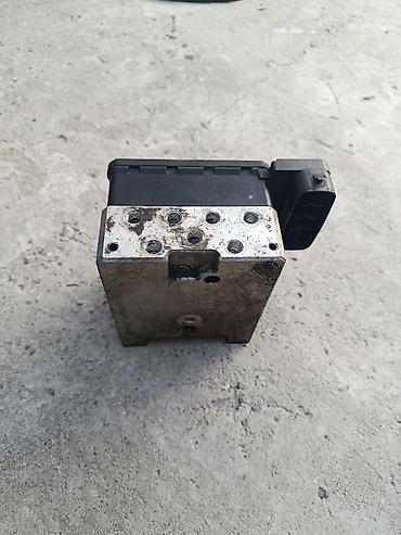 ABS: КУПЛЮ Блок ABS (гидроагрегат электронным модулем) Описание: - — 5