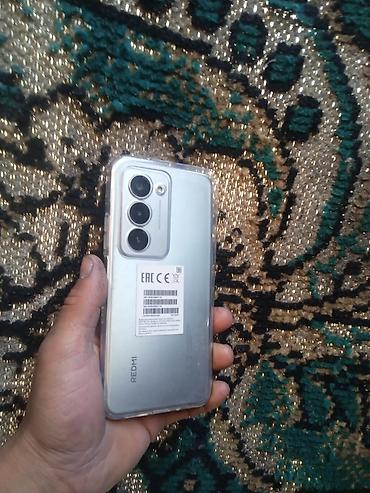 я ищу телефон айфон: Redmi, Redmi 13, Новый, 128 ГБ, цвет - Серебристый, 1 SIM, 2 SIM — 1