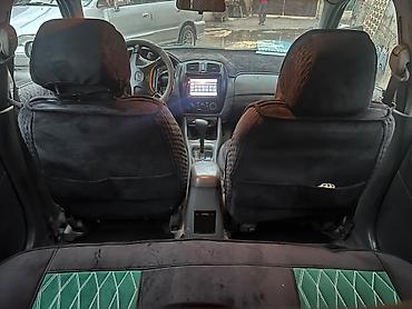 бампер виндом: Mazda Familia: 1999 г., 1.5 л, Автомат, Бензин, Седан — 8