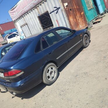 бак на зил: Mazda 626: 1998 г., 1.8 л, Механика, Бензин, Хэтчбэк