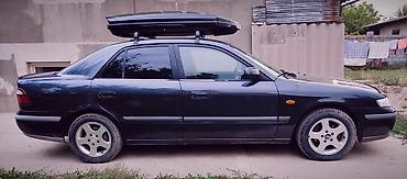 g comp: Mazda 626: 1999 г., 1.8 л, Механика, Бензин, Седан — 2