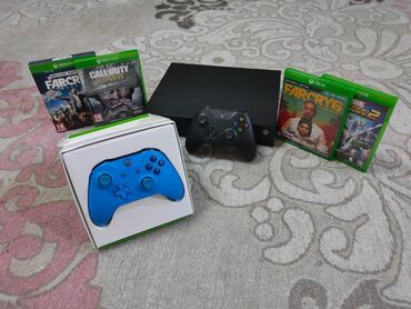 rol oyun konsolu: - Xbox one x (çox az iştenmiş) - 2 costik (biri ağ, biri mavi) -