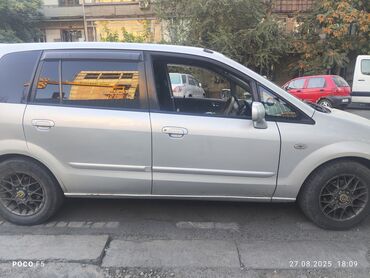 автомобиль ниссан кашкай: Mazda Premacy, серебристый компактвэн. Кузов и экстерьер: - 5‑дверный