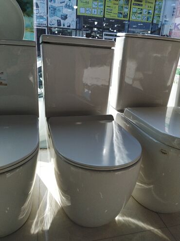 Unitazlar: Müasir dizaynlı, kompak təkgövdəli unitaz - Yumru xətli, minimalist