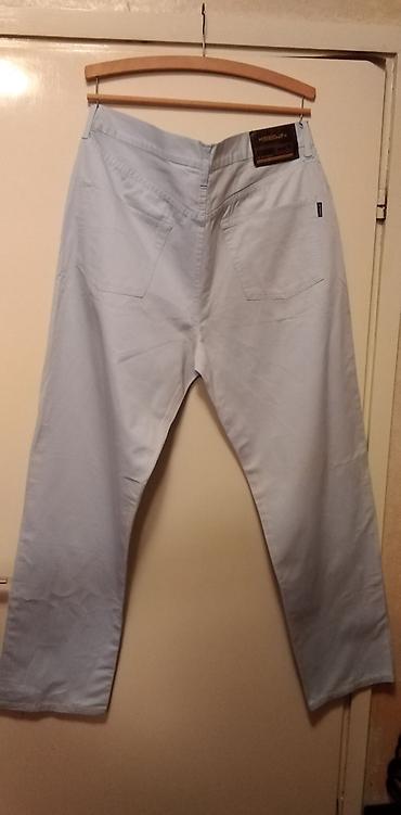 nesal jeans слике: Muske farmerke Keegan Italy svetlo plave vel.54,dimenzije:Duzina — 2