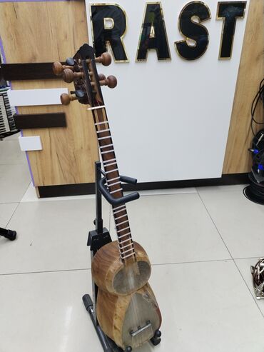 Akustik gitaralar: Professional tar Rast Musiqi alətləri Mağazamızin ünvanları; 1)