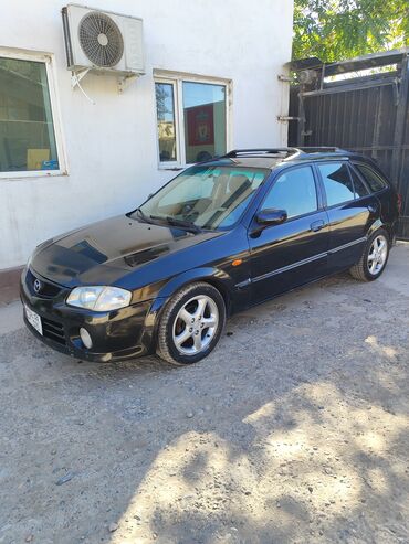 машина за 100000 сом: Mazda 323: 2000 г., 1.8 л, Вариатор, Бензин, Хэтчбэк