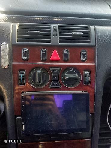 Mercedes-Benz: Mercedes-Benz E-Class: 2.3 l | 1995 il Sedan — 12