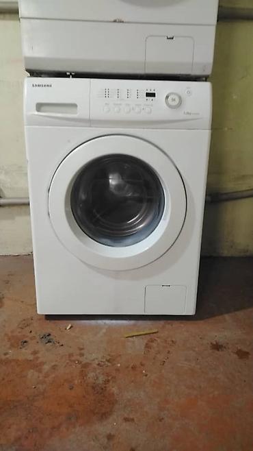 Automatic washing machines: Стиральная машина с фронтальной загрузкой белого цвета. Модель — 13