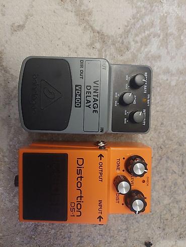 Elektro gitara üçün delay və distortion pedalı.Hər iki əla