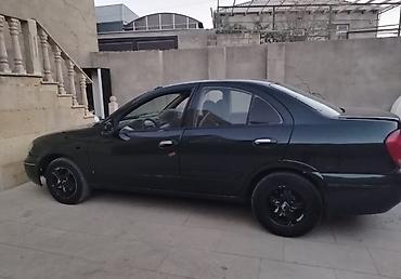 1997 nissan sunny: Nissan Sunny: 1.3 l | 2005 il Sedan — 6