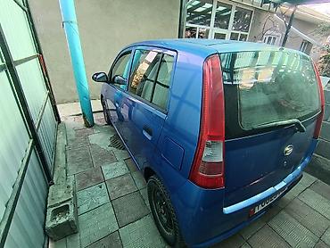 авто бак: Daihatsu Cuore: 2003 г., Механика, Бензин, Хэтчбэк — 3