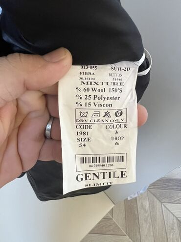 türkiyənin kişi cemperləri: Zolaqlı naxışlı boz rəngli kişi kostyumu. Kostyumun tərkibi 60% yun