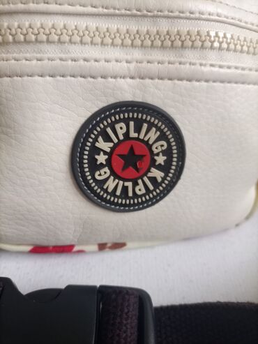 Torbe: Kipling original odlično organizirana 1500 din — 2