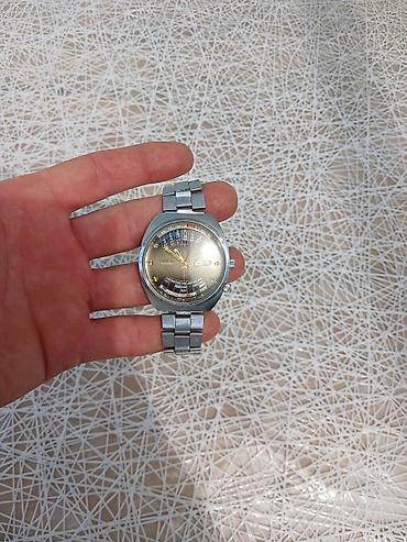 orient gence: Orient brendinin gümüşü rəngli polad bilərzikli qol saatı. Bu model — 5