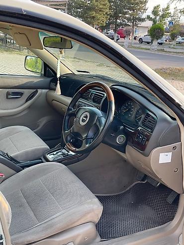 сетка рулон: Subaru Legacy Lancaster: 2000 г., 2.5 л, Автомат, Газ, Универсал — 7