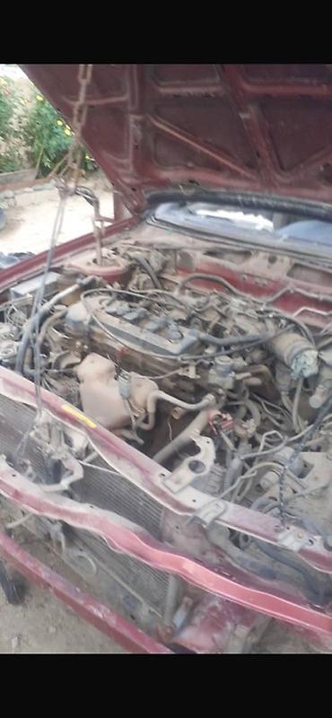 bye e2: Nissan Almera (седан), красный цвет, кузов P11. Описание: - — 8