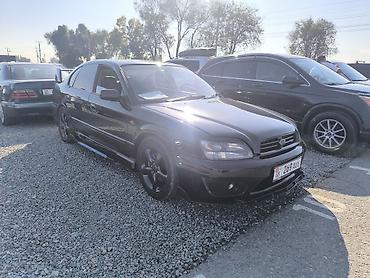 выхлопа: Subaru Legacy: 2002 г., 2 л, Механика, Седан — 3