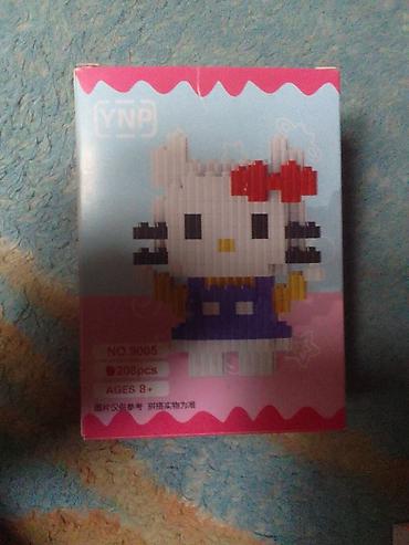 uşaq ucun oyuncaq: Hello Kitty fiqurunu yığmaq üçün mini blok konstruktor dəsti. Qutunun — 1