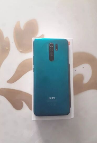 Xiaomi: Xiaomi Redmi 9, 32 GB, rəng - Yaşıl, 
 Barmaq izi, Face ID