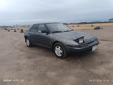Mazda: Mazda 323: 1991 г., 1.6 л, Механика, Бензин, Хэтчбэк — 3