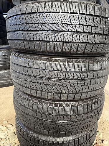 Комплект зимних шин Bridgestone 215/60 R16 95Q - Размер: 215/60 R16 -