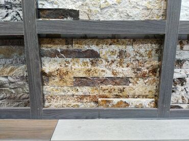 qonaq otagi ucun divar kagizlari: Dekorativ divar üzlüyü – təbii daş effekti - Material: Seramik/daş